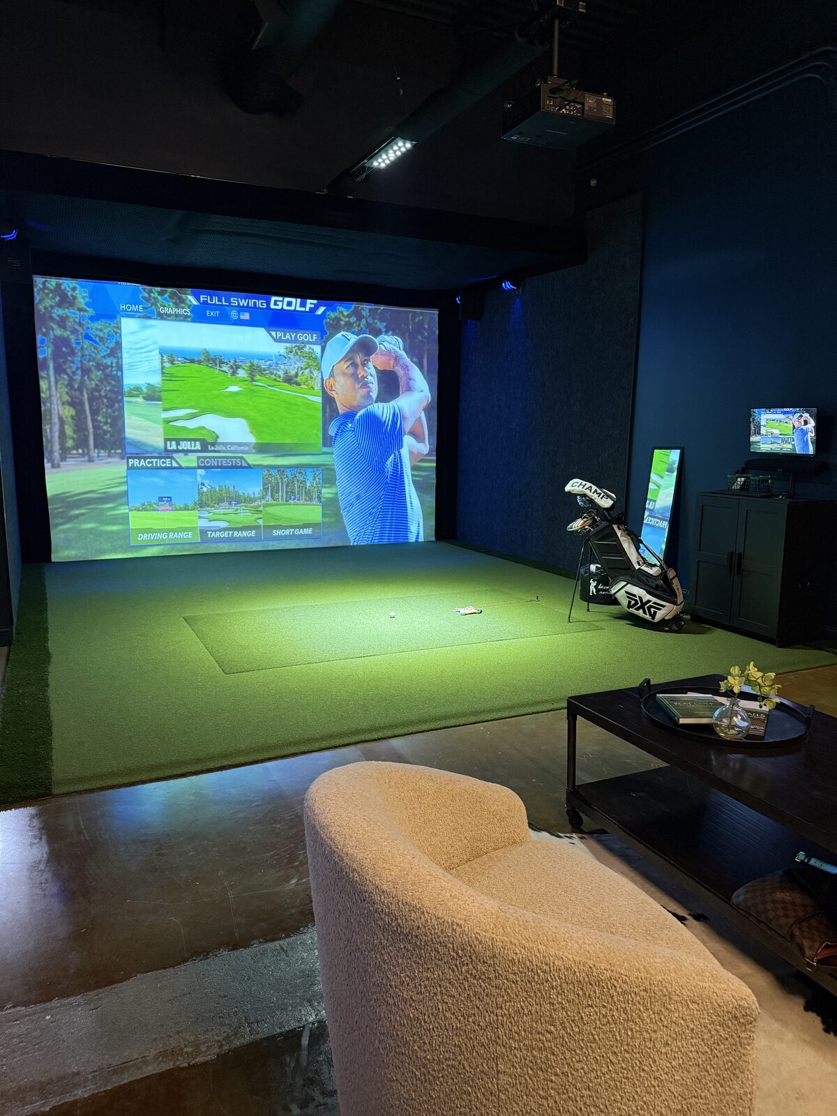 Golf simulator suite with swing on screen